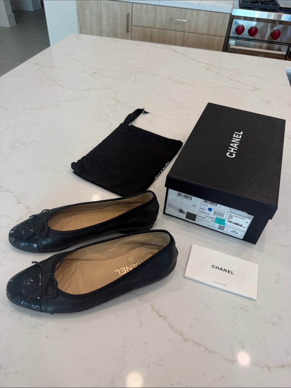 CHANEL Black Leather Cap-Toe Ballet Flats with Bow